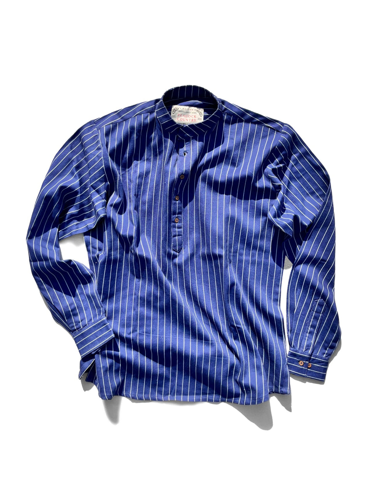 Blue pinstriped shirt on a white background